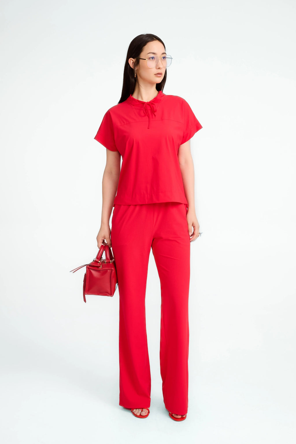 jane lushka lucca stretch tech top in red (front)