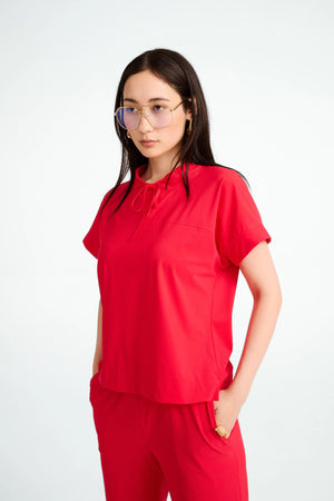 jane lushka lucca stretch tech top in red (front)