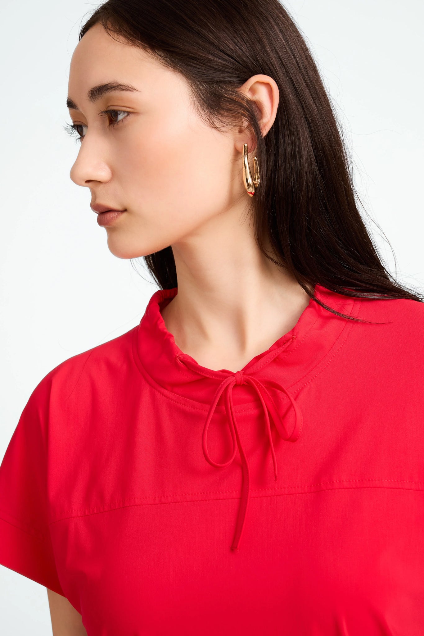 jane lushka lucca stretch tech top in red (detail)