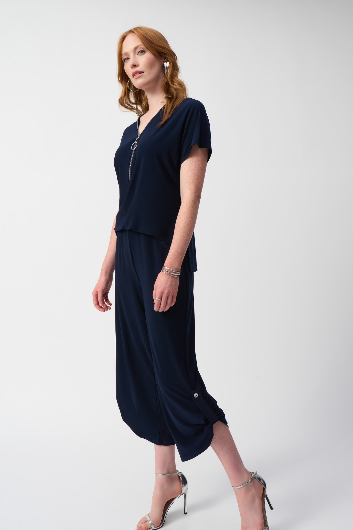 joseph ribkoff silky culotte jumpsuit in navy (side)