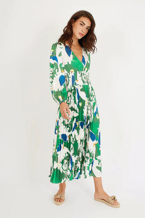 <p>Traffic people Aurora dress is fabulous in this abstract print in hues of green, white and blue. The pleated midi skirt creates ripples as you walk to amplify your movement. A flattering smock waist makes it all the more comfortable.</p>
<p>80% Viscose 20% Silk.</p>