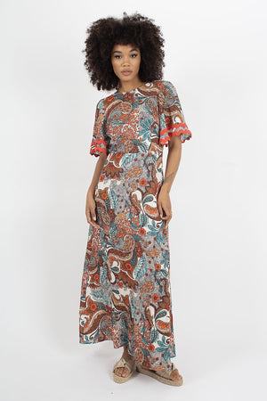 <p>Traffic people rene dress is fabulous in this paisley print, in hues of red, white and blue. Featuring 1/2 length flowy sleeves, v detail at the back and a flattering smock waist that makes it all the more comfortable. The perfect mmaxi length summer dress.</p>
<p> </p>