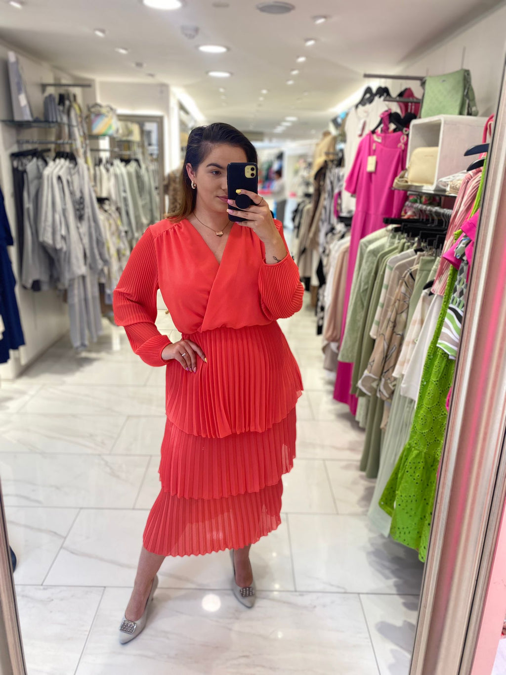 long sleeve tiered skirt with pleat detail and wrap style vneck midi dress in coral (front)