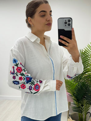 Musy muse Floral embroidered blouse in white (front)