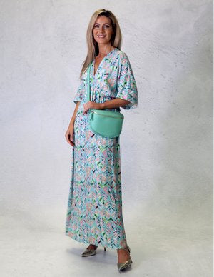 Deck leaf printed maxi dress with v-neck, empire waistline and bat-wing style top in mint green with pink print (front)