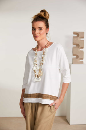 naya frill trim hem top in cream & fudge (front)