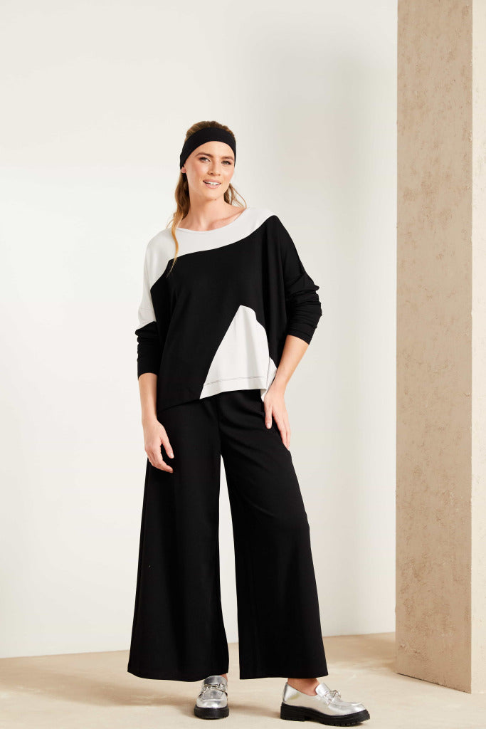 naya wide leg trousers with side split in black (front)