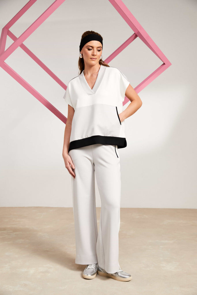 naya contrast panel side seam trousers in sand&off white (front)