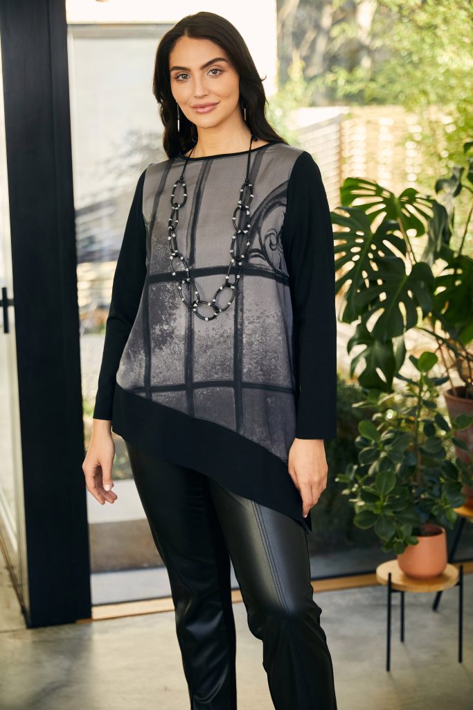 ora printed asymmetric hem top in black (front)