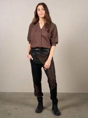 nu denmark vesta trousers in black & brown (front)