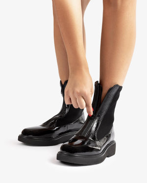 unisa mix material zip ankle boot in black (front model)