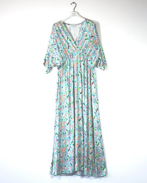 Deck leaf printed maxi dress with v-neck, empire waistline and bat-wing style top in mint green with pink print (front)