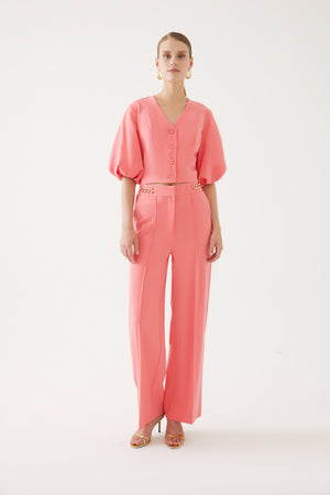 Exquise wide leg trousers in coral with chain detail on waistband, matching top available