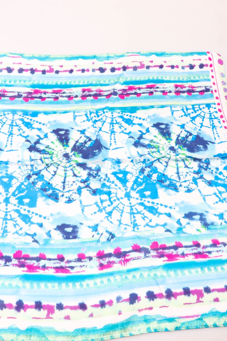 Tie dye print neck scarf in blue, purple and turquoise. 80% polyester 20% silk 